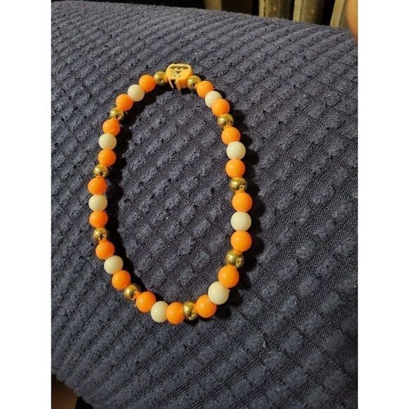 Handmade Orange and White Halloween Stretch Bracelet with Pumpkin - Picture 7 of 11